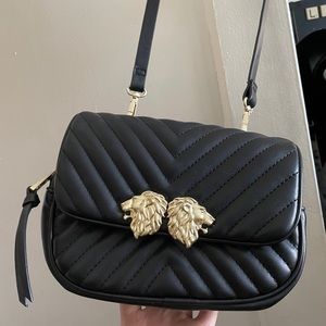 Zara’s cross body black bag